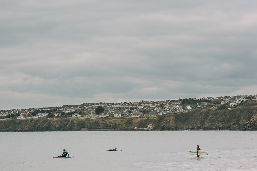 Surfers testing the waves Surfers testing the waves