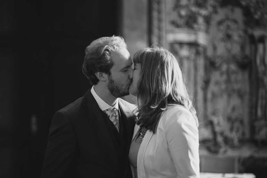 Bride and groom kissing